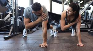 Fitness trainer demonstrating arm toning exercises Wokingham 	