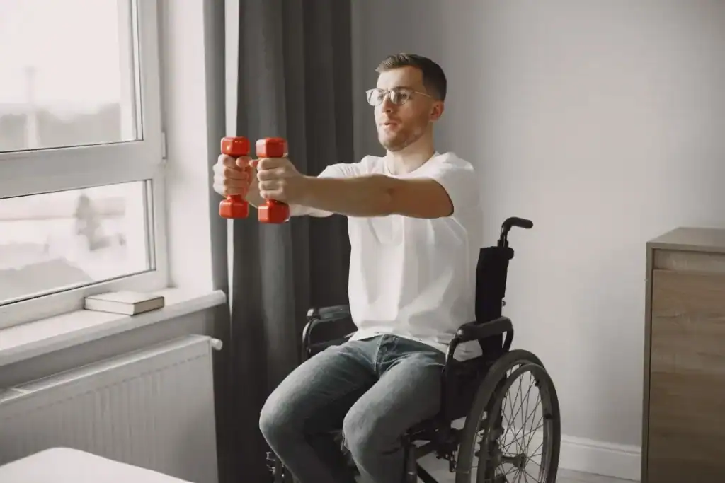 Empowering Weight Loss: A Comprehensive Guide for Individuals with Disabilities 1 Image of man doing exercise in his wheelchair to aid weight loss Wokingham