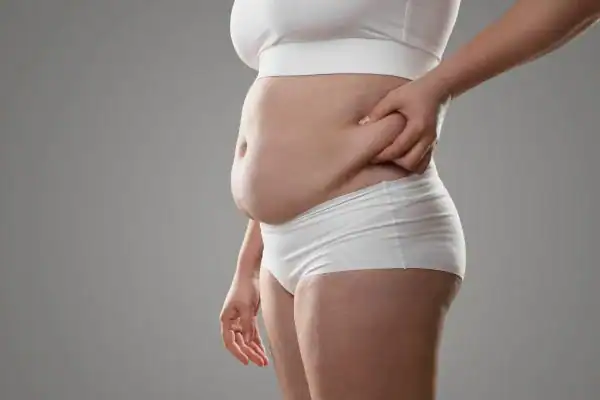 The Hidden Connection: How Stress Shapes Your Fitness and Body Composition 1 Image of stress belly Wokingham How Lipo 360 can help manage your symptoms
