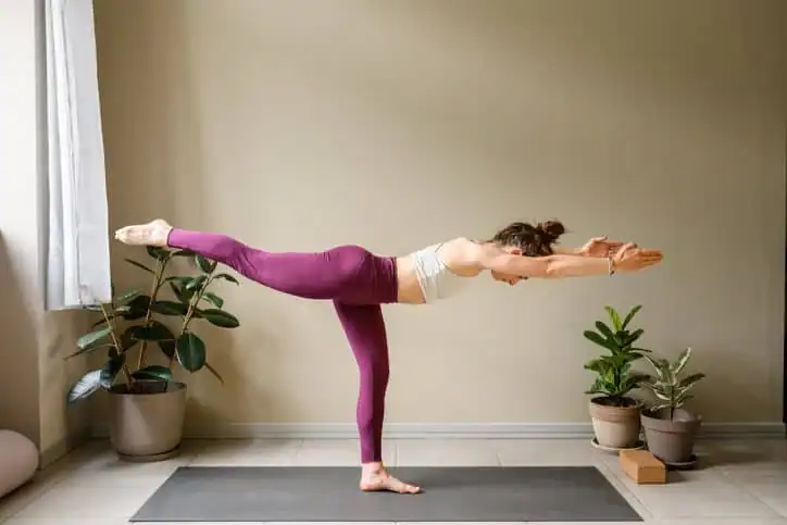 Woman doing Yoga exercise Wokingham 	 to help with toning the body. 