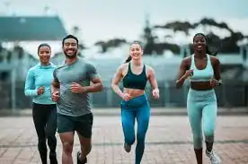 image of man and 3 women doing cardio exercise Wokingham 	 to help tone and remove fat from the body.