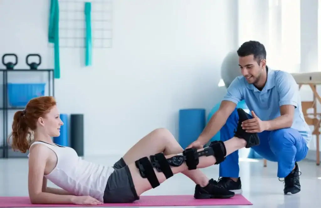 Debunking Meal Timing Myths: The Truth About Muscle Recovery 1 Woman having treatment to help muscle recovery Wokingham after an injury