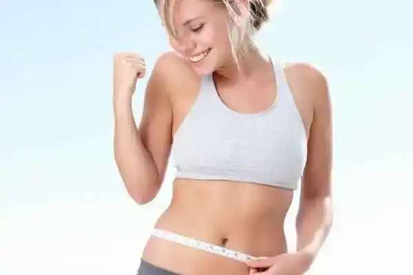 Unraveling the Mystery: Where Does the Body Fat Loss From First? 3 Image of woman happy with fat loss Wokingham
